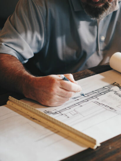 Architect drafting designs by hand.