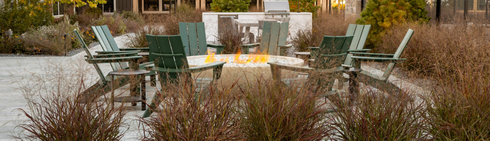 Chairs around a fire pit.