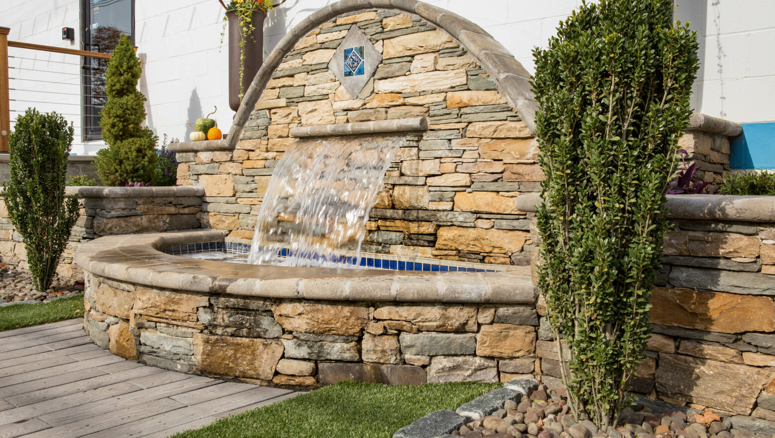 Natural stone water fountain located at the Dex by Terra headquarters in Hudson, Massachusetts.
