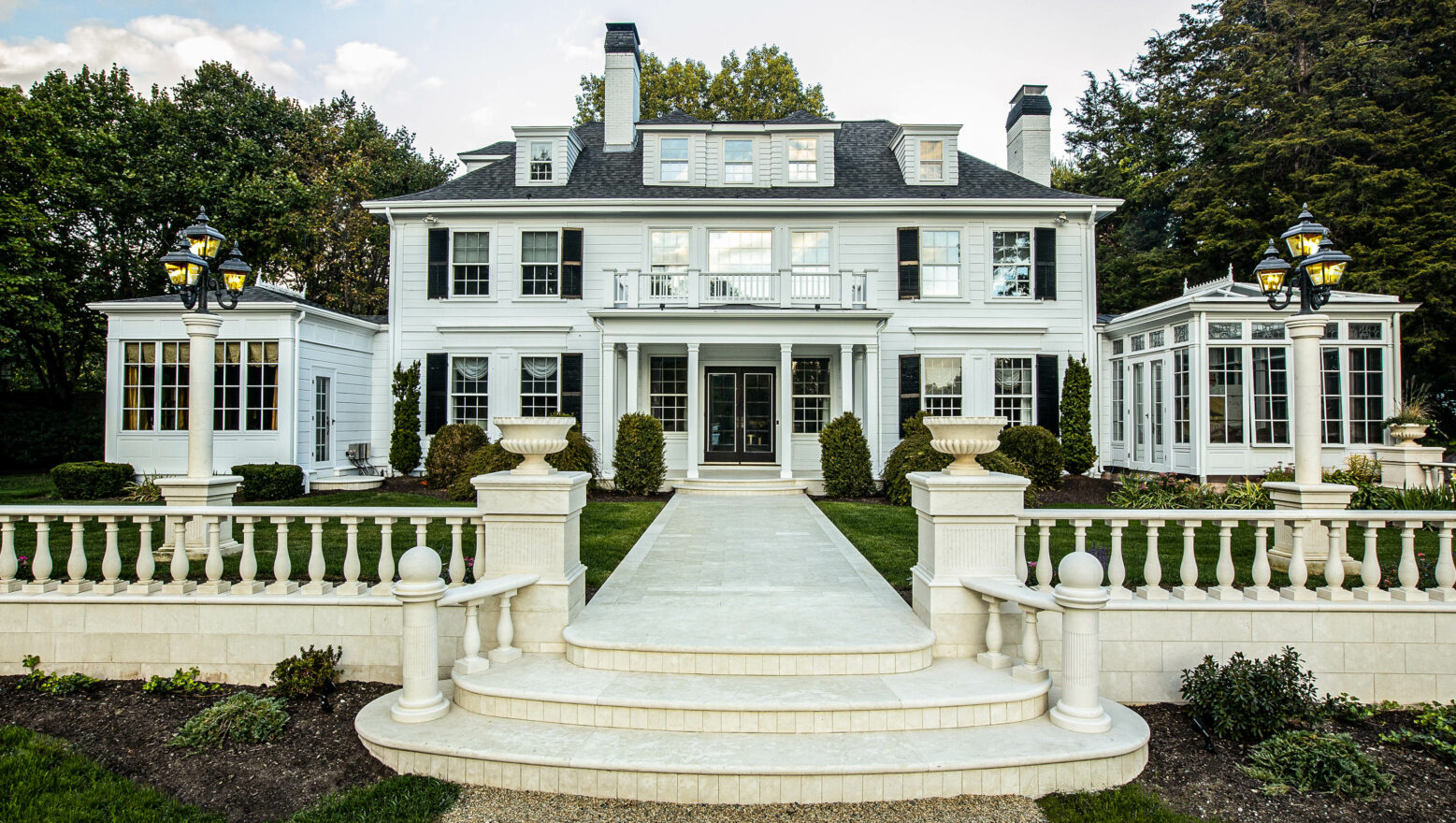 Stone steps leading to mansion courtyard. Dex by Terra Residential Landscape Design & Build Project in Natick, Massachusetts