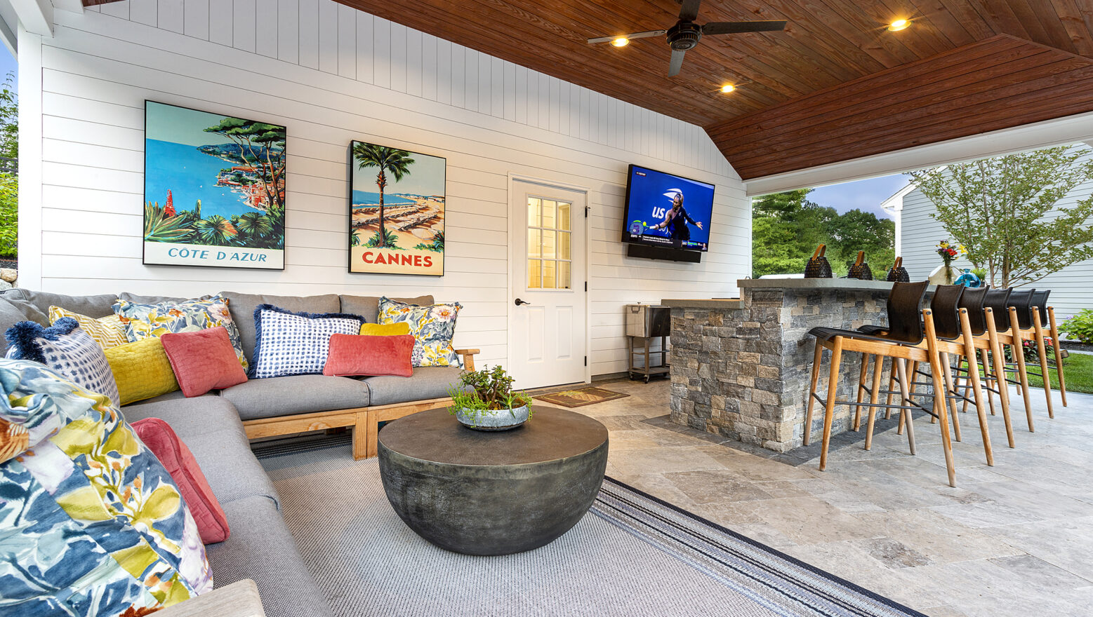 Lounge area patio and outdoor kitchen under the pergola. Dex by Terra Landscape Design & Build Project in Norfolk, MA.