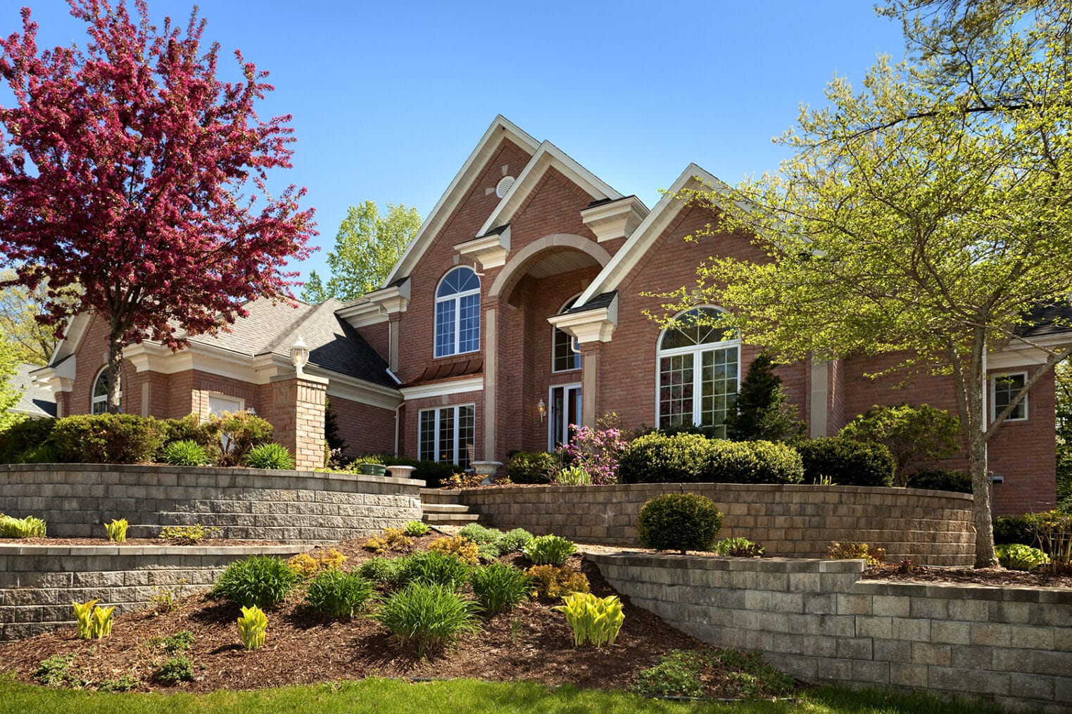 Mansion Home Exterior Design; Terraced Paved Landscape, Colorful Spring Foliage