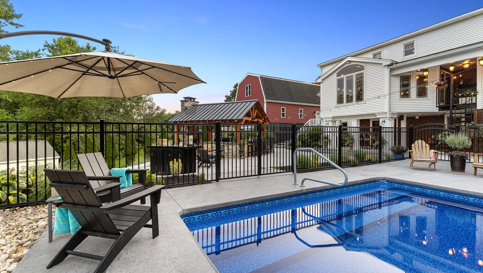 Seamless, textured, stamped concrete was used for the pool deck at this home in Auburn, Massachusetts.