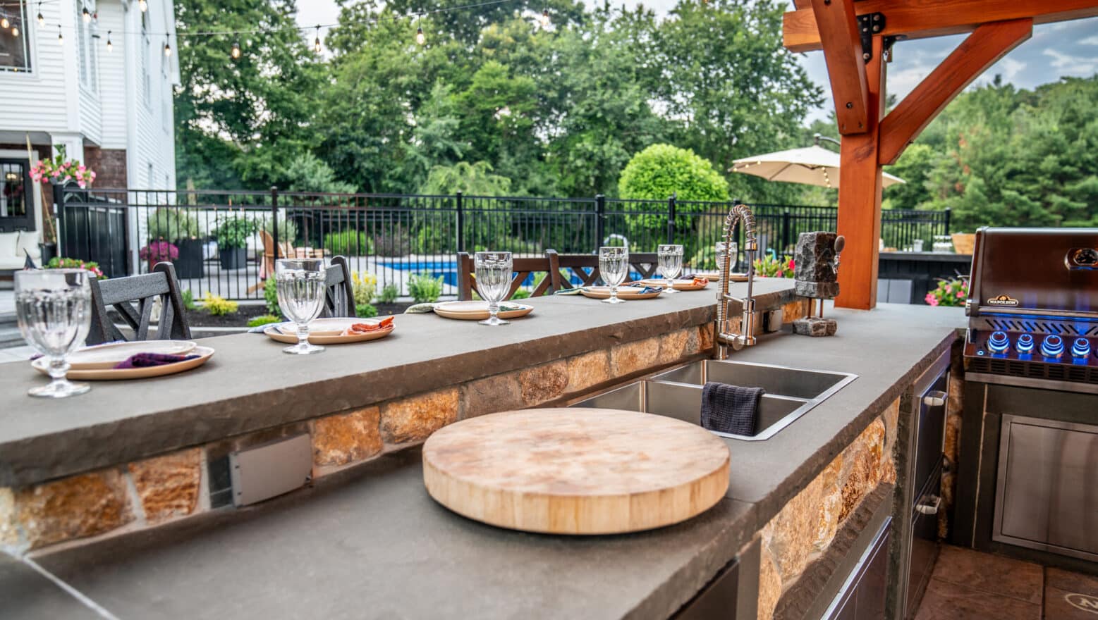 Venetian bluestone countertops were used for the food preparation space in this outdoor kitchen.