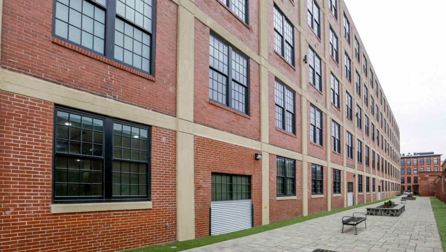 Converted warehouse with brick exterior after restoration & repointing. Dex by Terra Commercial Masonry project.