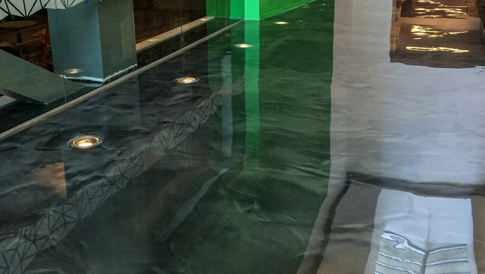 An epoxy concrete floor in a commercial building in Massachusetts. Work by Dex by Terra.